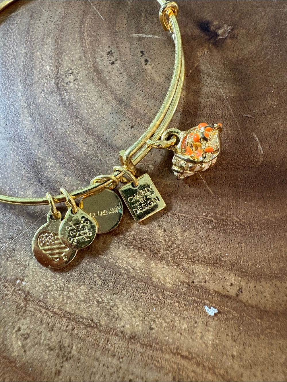 Alex and Ani Gold Expandable Bracelet with Orange hermit crab charm